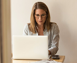 Woman on laptop at home